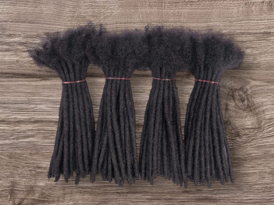 Four bundles of real hair micro loc extensions, ready to install